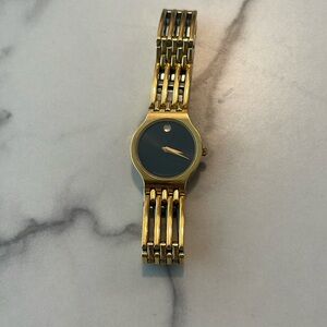 Movado gold tone watch used